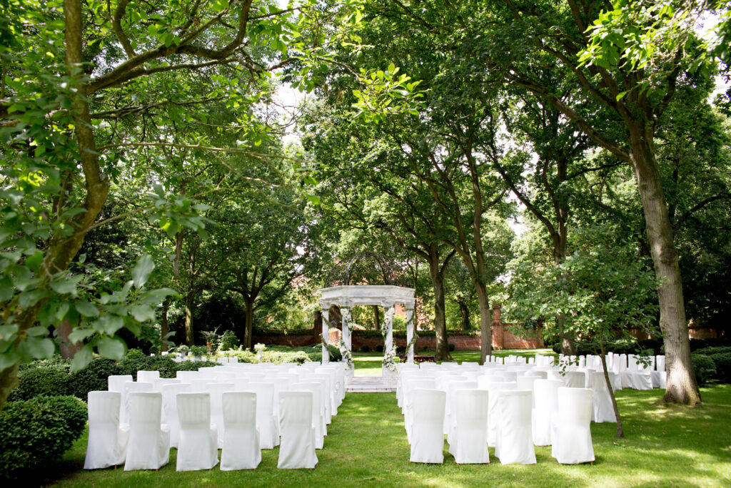 Pergola and seating arrangement at Creeksea Place Manor Hall, Essex