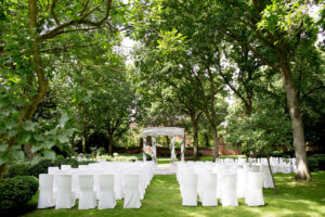 Pergola and seating arrangement at Creeksea Place Manor Hall, Essex