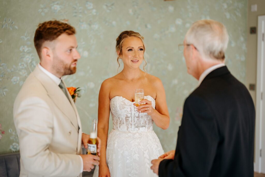 Civil Weddings Celebrant speaking warmly to the couple post-ceremony.