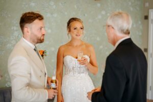 Civil Weddings Celebrant speaking warmly to the couple post-ceremony.